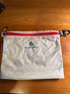 Lightweight White and Red Pouch with Black Carabiner Clip
